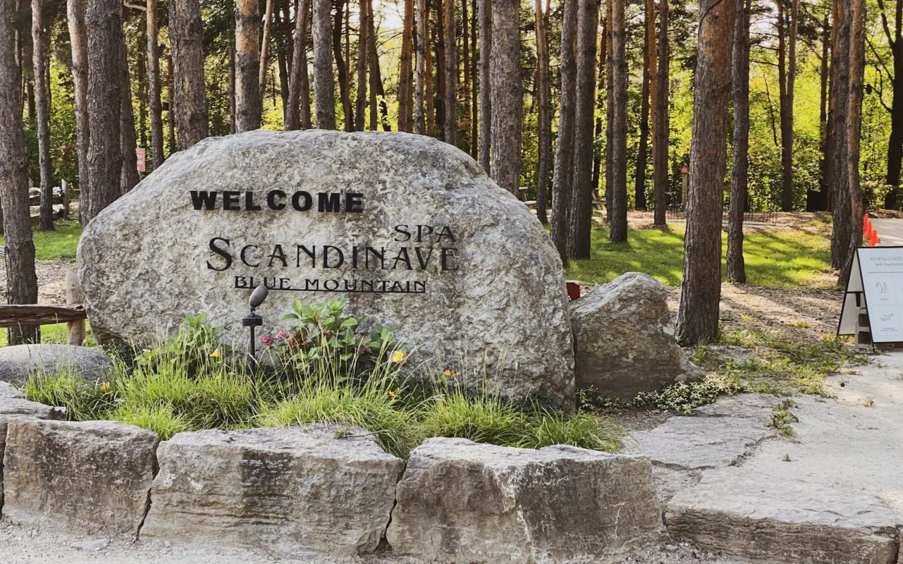 the large rock sign for Spa Scandinave Blue Mountain | collingwood attractions	